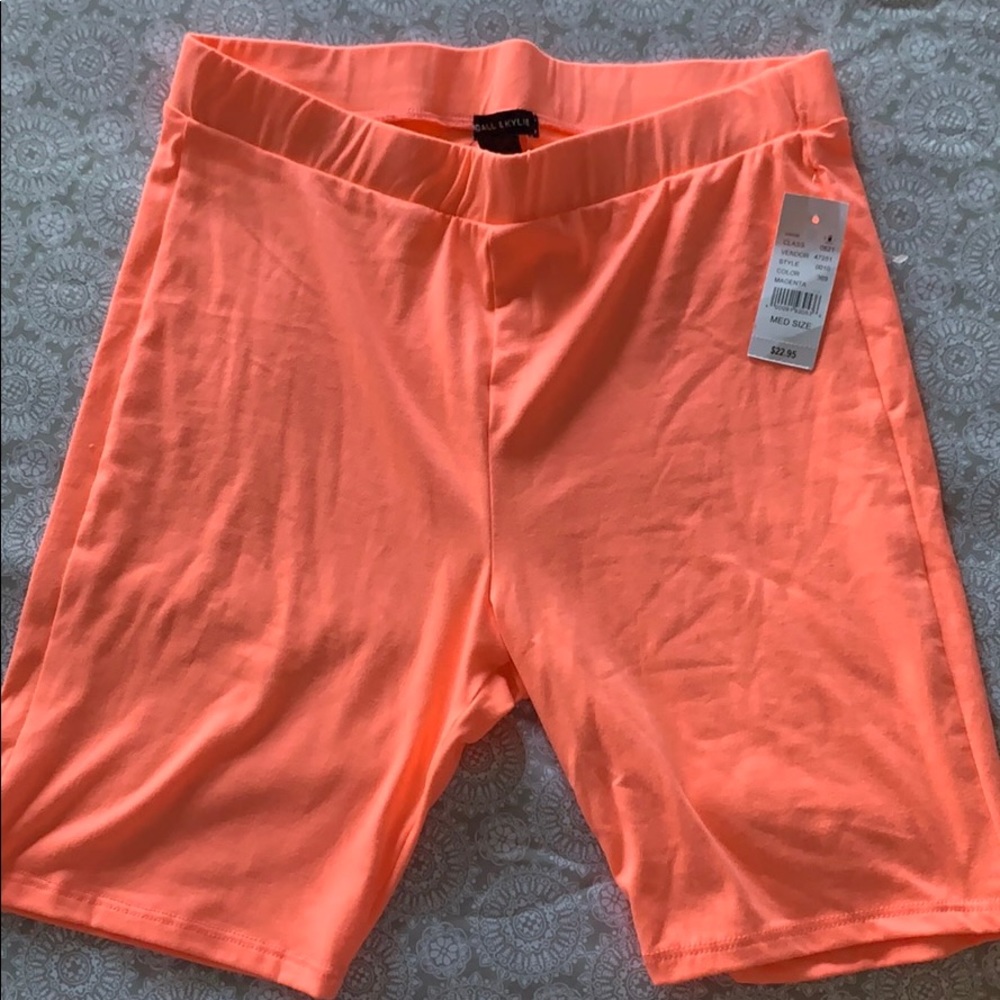 neon pink biker shorts